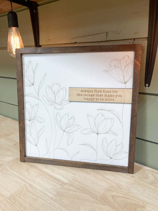 “Find time for the things that make you happy to be alive” sign